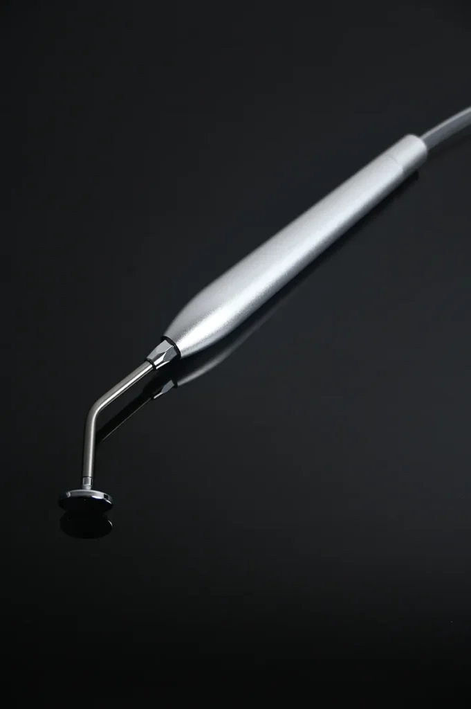 Oxygen injection handle for hydradermabrasion facial skin care machine