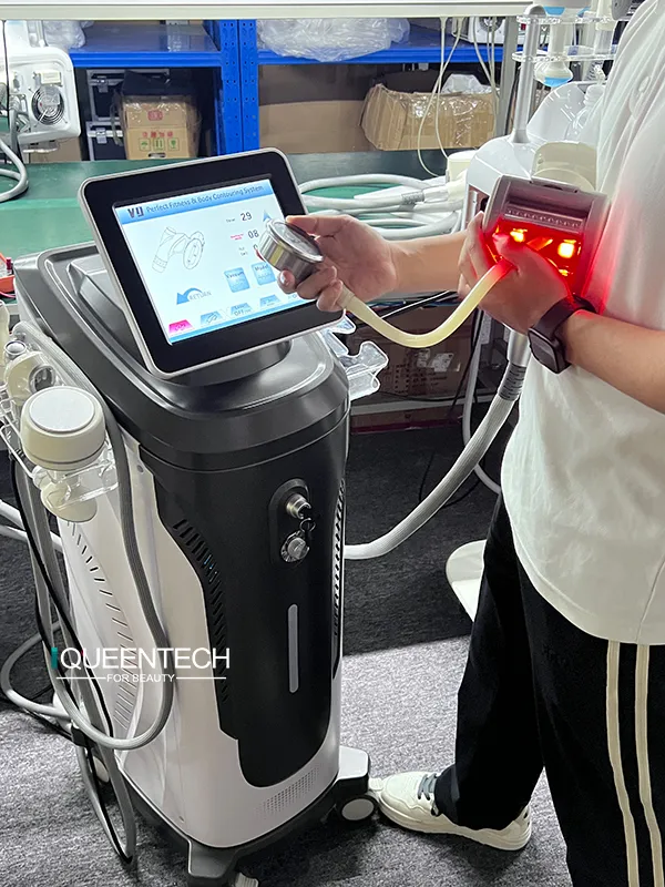 Factory technician conducts negative pressure performance test on big roller RF handpiece of Lymphatic Roller Machine before shipment inspection
