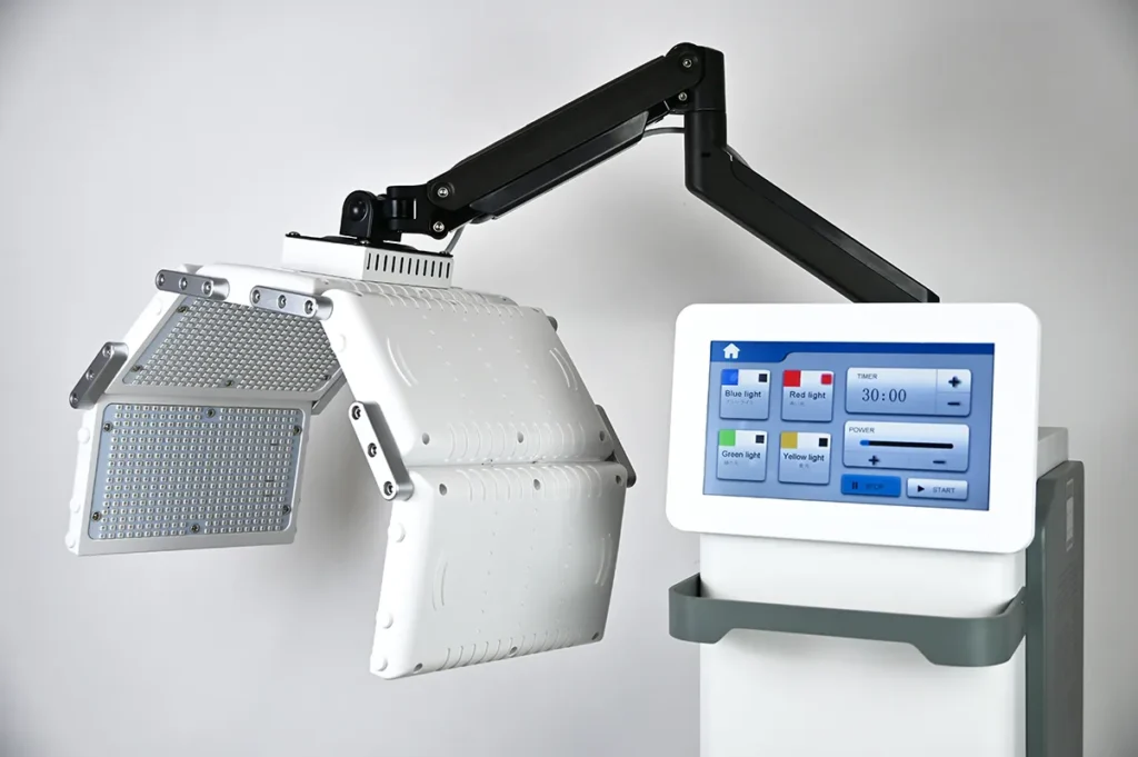 Appareil Luminothérapie Visage mobile professionnel détail produit, machine photothérapie LED sur chariot à roulettes avec bras articulable et écran tactile pour institut de beauté