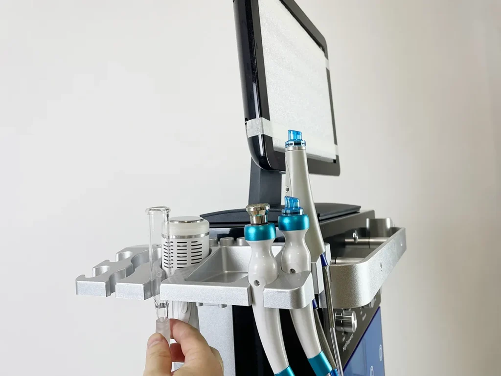 Appareil Hydrodermabrasion Multifonctionnelle 15 en 1, installation du stylo à vide, montage de la poignée d'aspiration pour extraire les impuretés cutanées
