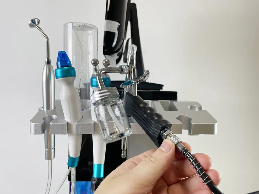 Install water spray handle for 15 in 1 Hydradermabrasion Machine