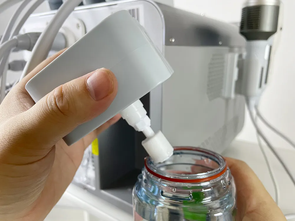 Appareil hydrodermabrasion portable Smart Ice Blue Pro, vidange du liquide usé
